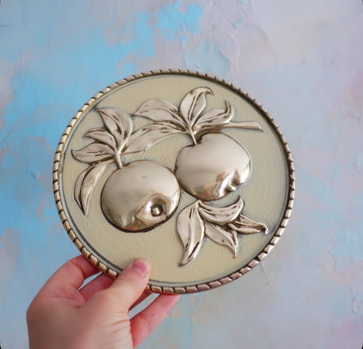 Set of four brass fruit wall plaques