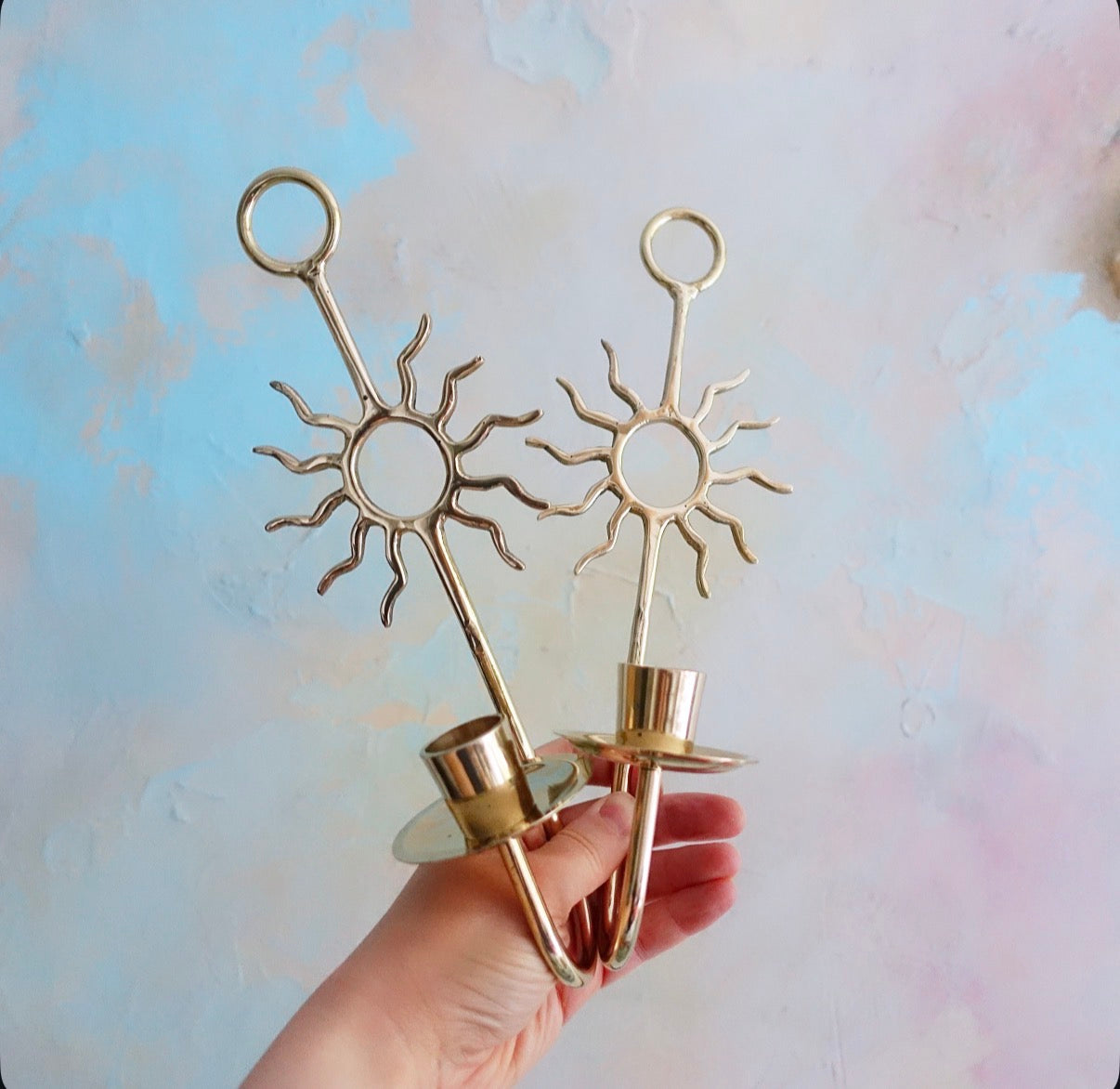 Pair of celestial brass sun candle sconces