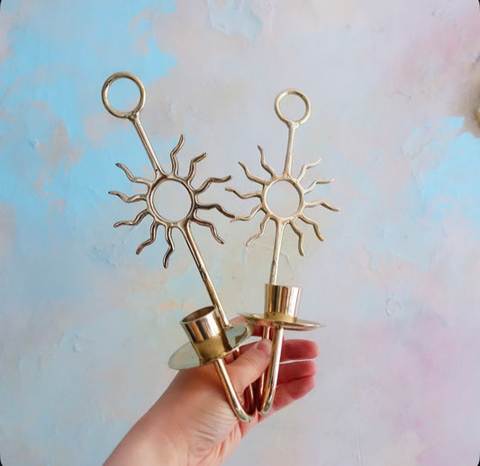 Pair of celestial brass sun candle sconces