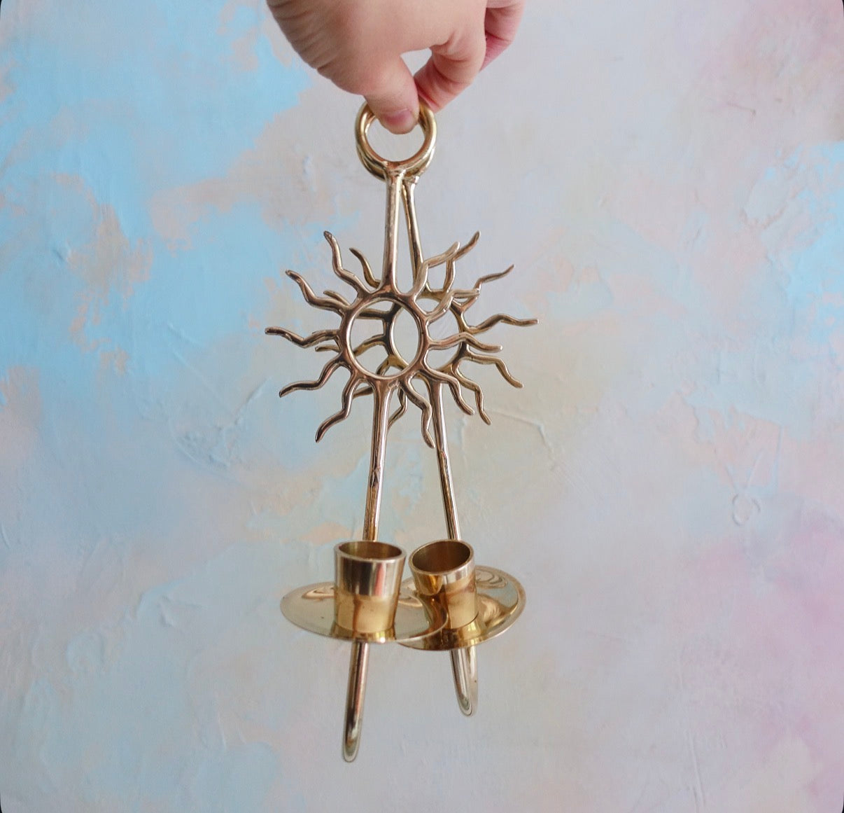 Pair of celestial brass sun candle sconces