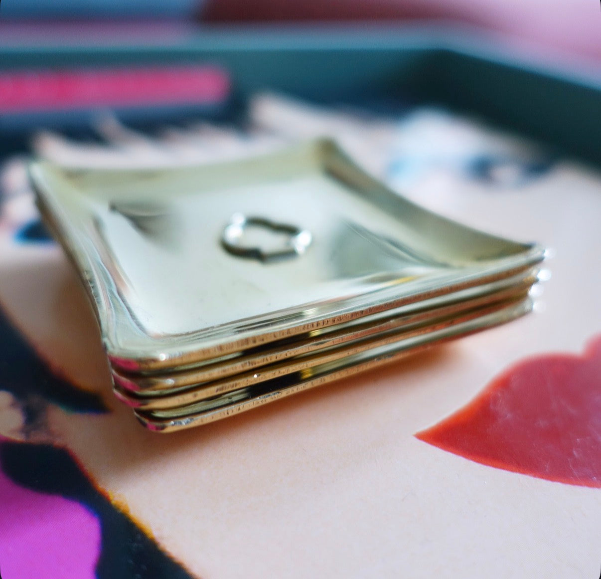 Set of four brass card suit trinket dishes